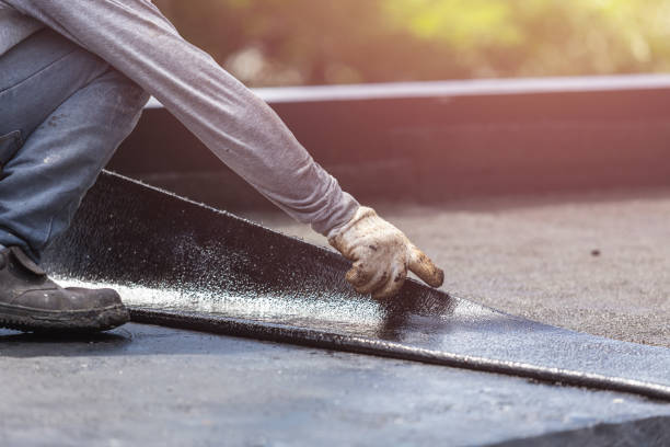 Professional Waterproofing technician working in Forest, VA